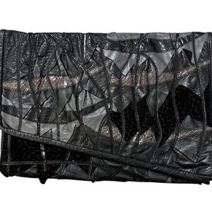 Vintage 7 Handbags by Dimitri Black Patchwork Leather Clutch